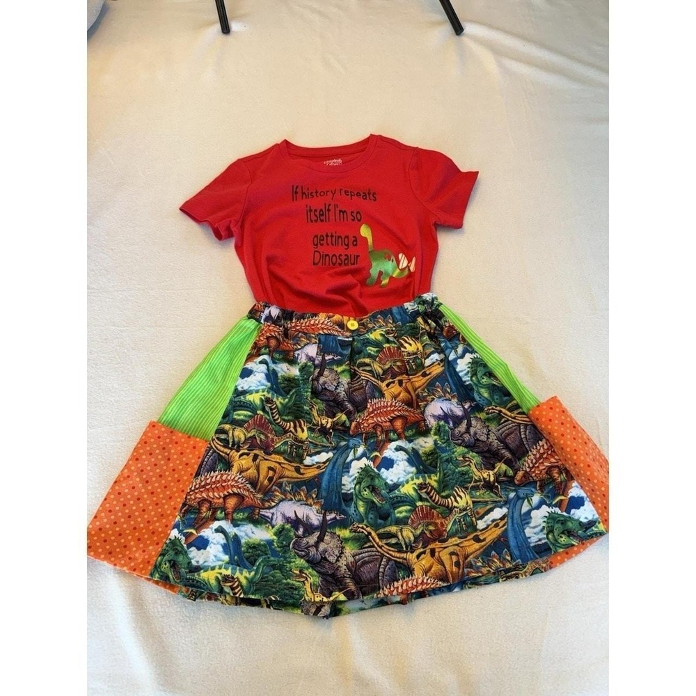 handmade skirt in size 6/7 has a fun and unique feature dinosaurs inside pockets
